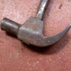 Metallic claw hammer