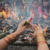 Women taking aarati to complete their fasting